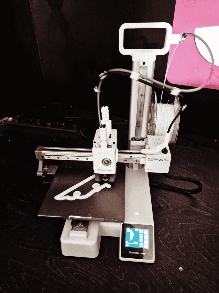 Bambu Lab A1 Mini, one of the Best 3D Printers for beginners, printing a model with PLA PETG 3D Printer setup