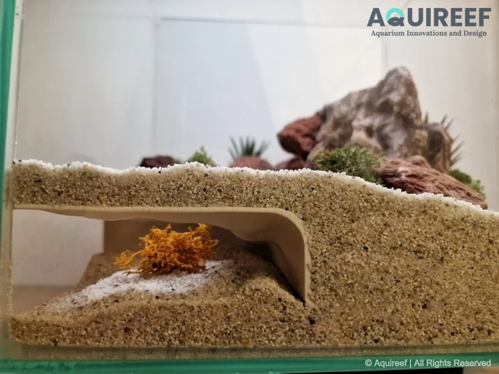 A side view of the volcanic corner cave designed for cichlids and similar fish species by Aquireef.